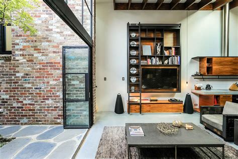 It's a lot more than that. Old Garage with Heritage Façade Finds New Life as a Fabulous Family Home
