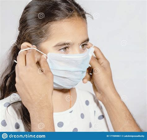 Prevention Of Spreading The Coronavirus Or COVID-19 Outbreak By Wearing Mask - Father Wearing A ...