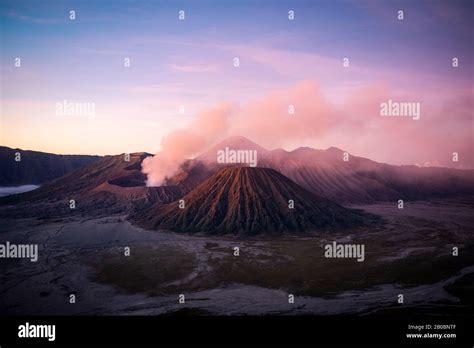Volcanic Landscape At Sunrise Smoking Volcano Gunung Bromo With Mt