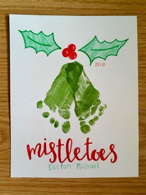 christmas footprint art diy mistletoes craft  baby keepsake baby christmas crafts babys