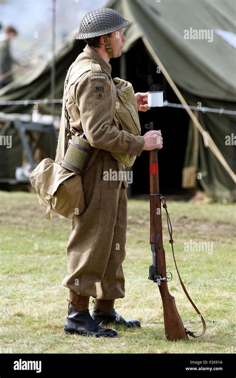 A Re Enactor Dressed In The Uniform Of A Ww2 British Army Home Guard