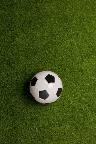Soccer Ball On Green Grass Background Stock Photo Download Image Now