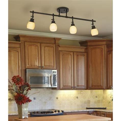 The first option is to keep the soffit open; Replace fluorescent light in kitchen with track lighting ...