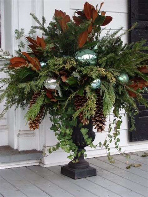 When considering a naturally decorated tree, harvest materials that speak to you. Gorgeous Christmas Urns - OMG Lifestyle Blog