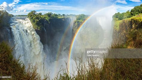 Rainbow Over Victoria Falls Zimbabwe Africa High Res Stock Photo