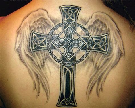 Dark ink cross tattoo on full back. 25 Unbelievably Cool Cross Tattoo On Back - SloDive