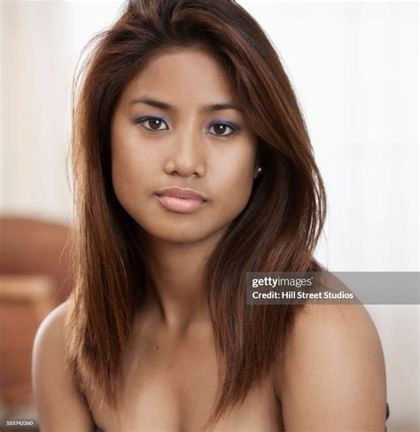 Serious Filipino Woman High Res Stock Photo Getty Images