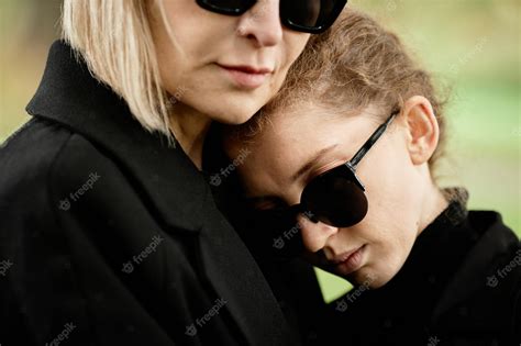 Premium Photo | Closeup of mother and daughter embracing at outdoor