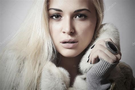 beauty blond model girl in mink fur coat beautiful woman winter style