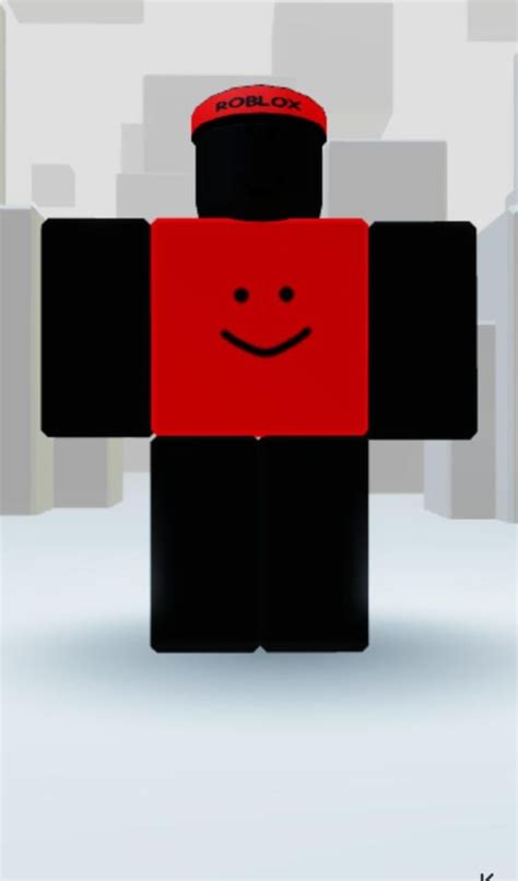 A Red And Black Lego Figure With A Smile On Its Face Standing In