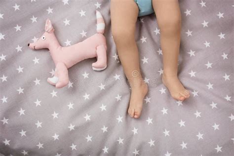Little Baby Legs On Bed Stock Photo Image Of Cloth 109224064