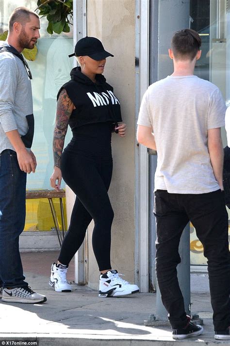 Amber Rose Shows Off Her Fabulous Figure In Tight Leggings For Magazine
