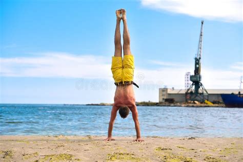 Man Standing On Hands Stock Photo Image Of Adult Concentration 75407240