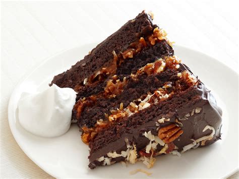 A german chocolate cake is an impressive looking cake. German Chocolate Cake With Coconut-Pecan Cajeta Frosting ...