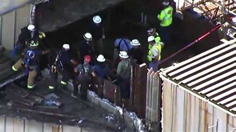 Pictures Worker Rescued After Falling From Scaffolding