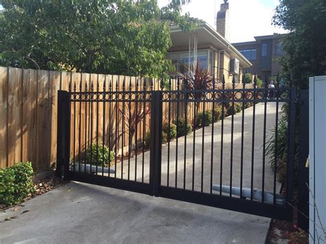 Most driveway gates swing inward, meaning as you pull into the driveway, the gates swing away from you and in toward the house. Fixing an Automated Swinging Driveway Gate | Melbourne ...