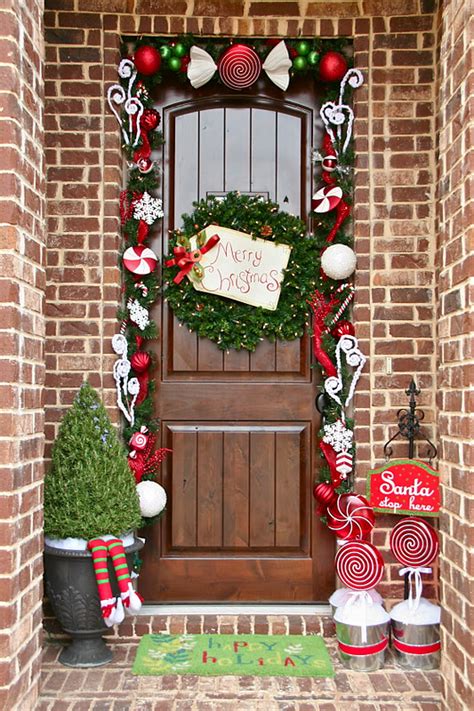 Enhance this indoor christmas decoration idea with a string of garland and lights that are positioned around the frame of the door. 40 Christmas Door Decorations Ideas You Can Copy ...