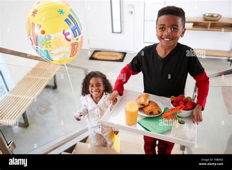 Happy Children Bringing Breakfast Parents Hi Res Stock Photography And