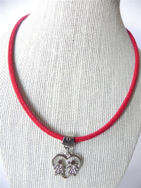 Artículos similares a Red leather cord necklace silver boys pendant