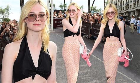 Elle Fanning Displays Enviably Taut Abs In Black Crop Top Daily Mail