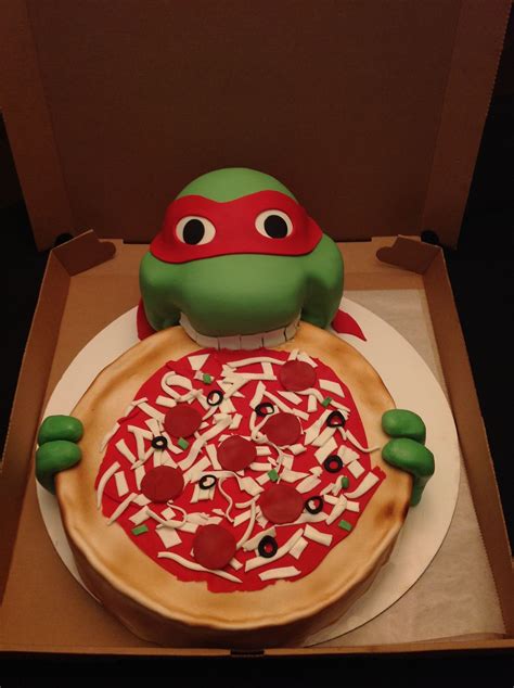 A Cake In The Shape Of A Teenage Mutant Pizza