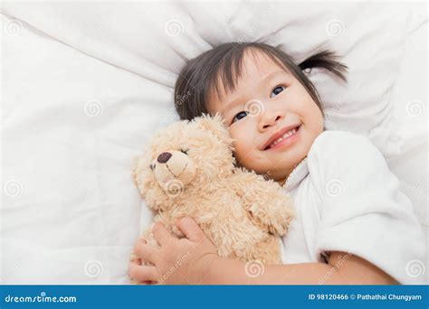 Asian Little Girl Hugging The Teddy Bear Stock Photo Image Of Cover