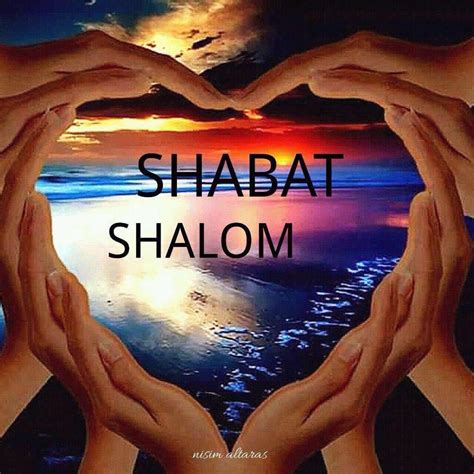 Two Hands Making A Heart Shape With The Words Shabat Shalohm In Front