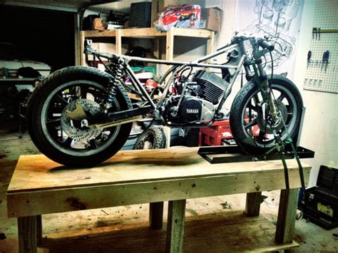 That's just what sirteen's aerowood is, and you put the thing together yourself. DIY Motorcycle Table / Lift | Cafe Matty