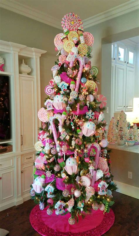 Holiday design expert brad schmidt decorated this wintry, whimsical christmas tree in soft blush, gold and ivory ornaments from balsam hill. Candy Christmas tree. Candyland tree. Candy land tree ...