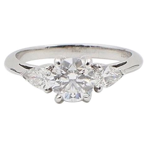In 1886, tiffany introduced the engagement ring as we know it today. Tiffany and Co. Three-Stone Diamond Engagement Ring 1.60 Carat E VVS1 Platinum For Sale at 1stdibs