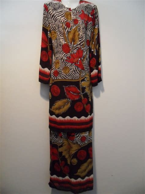 Rekaan baju kurung moden yang direka oleh zuco fashion. blog: ***BAJU KURUNG MODEN***
