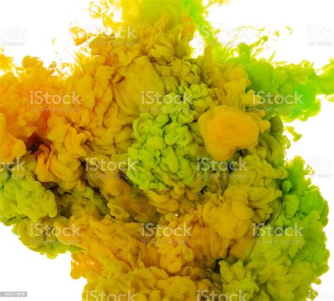 Abstract Paint Background Color Of Green And Yellow Ink Splash In The