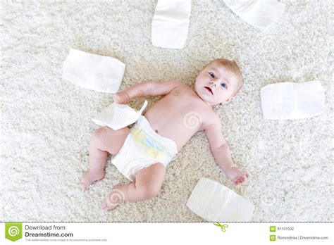 Newborn Baby Girl With Diapers Dry Skin And Nursery Stock Photo