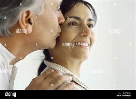 Wife Kissing Husbands Cheek Hi Res Stock Photography And Images Alamy