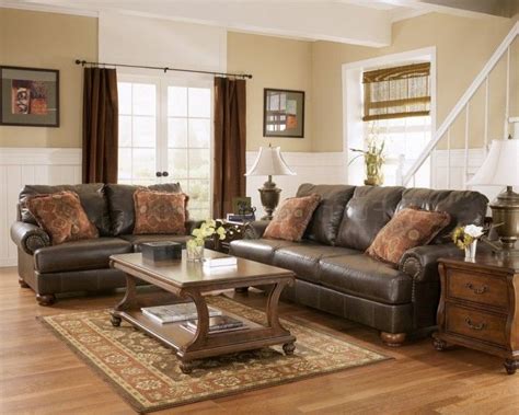 On the walls, white paint with. Living room paint ideas with brown leather furniture ...