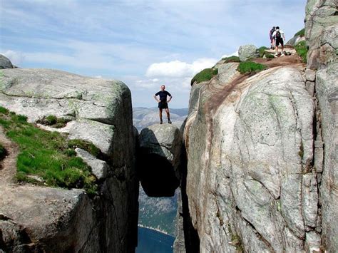 Kjeragbolten Is A Boulder Wedged In A Mountain Crevice In The Kjerag