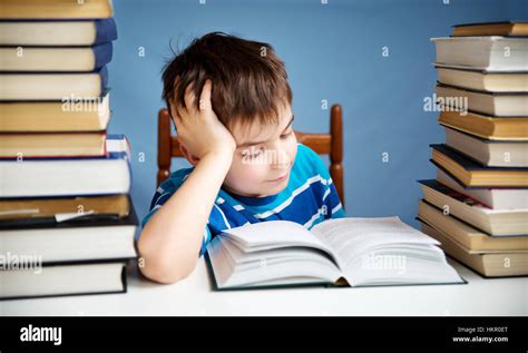 Seven Years Old Child Reading A Book Stock Photo Royalty Free Image
