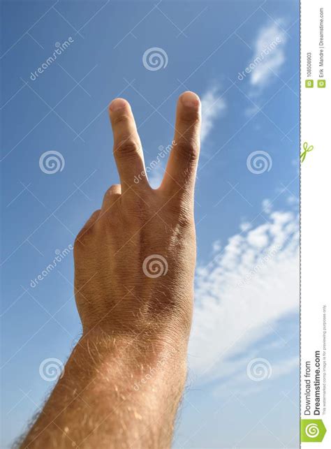 Hand Sign Of Victory Victory Hand Sign With Blue Sky Stock Image
