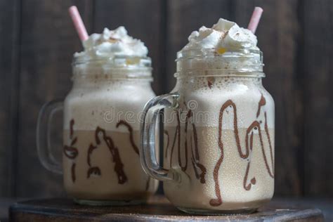 Cold Coffee Drink Frappe Frappuccino With Whipped Cream And Straws