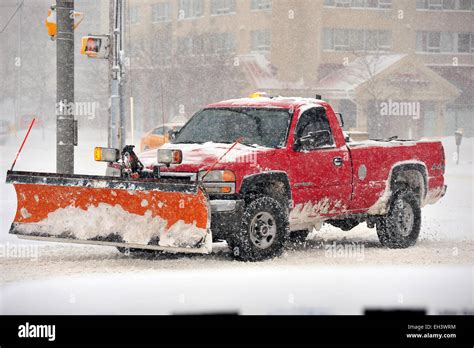 A Snowplow Attached To A Red Pick Up Truck In Canada Stock Photo Alamy