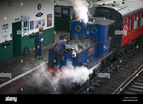Volunteers With A Sentinel 040 Vertical Boiler Steam Train Operated By