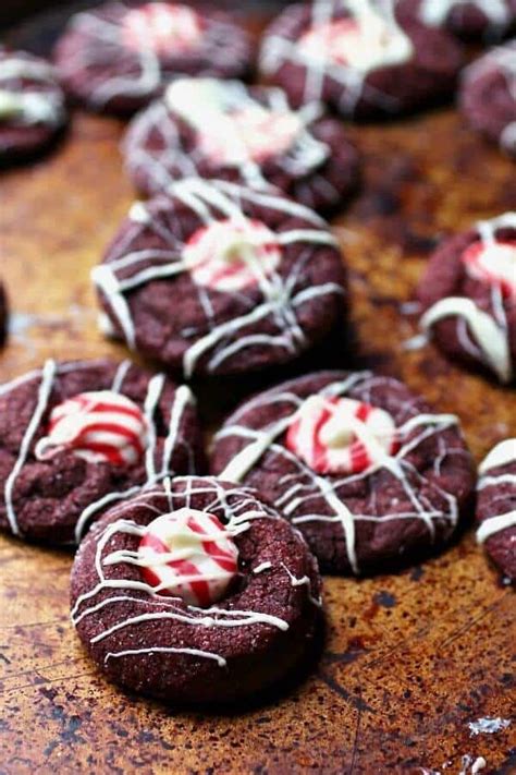 It's not christmas without these peanut butter blossoms cookies. Hershey Kiss Cookies: Holiday Red Velvet Peppermint | Restless Chipotle