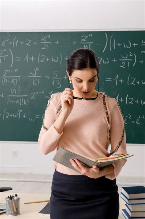 The Female Teacher Standing In Front Of Chalkboard Stock Image Image