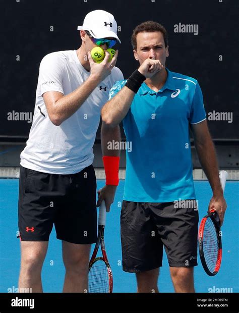 Britain S Jamie Murray Left And Brazil S Bruno Soares Talk During Their Double Match Against