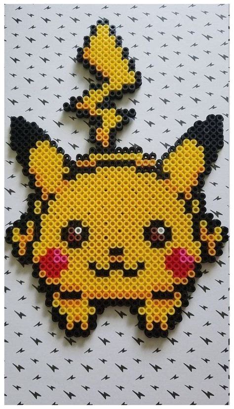 A Piece Of Art Made Out Of Perler Beads With A Pikachu On It