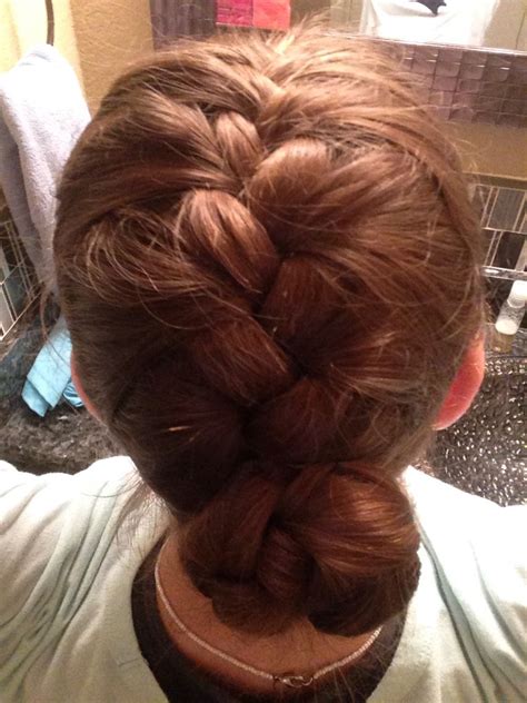 Divide the ponytail into two uneven sections. French braid into a braided bun | Hair styles, French ...