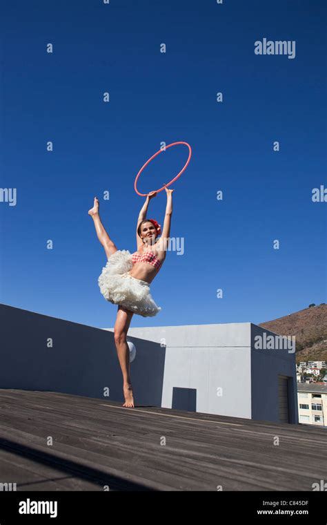 Woman In Tutu Dancing With Hula Hoop Stock Photo Alamy