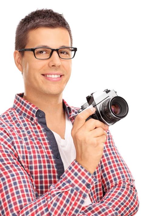Young Male Photographer Holding A Camera Stock Photo Image Of Holding