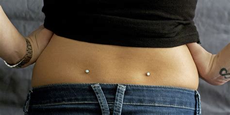 Piercing The Unusual All About Back Dimple Piercings Zwivel