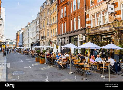 Al Fresco Roadside Lunchtime Socialising Dining Eating And Drinking In Pedestrianised